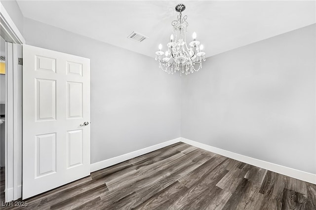 9405 Crosspointe Ave, Las Vegas, NV 89117 - empty room with a chandelier and dark wood-style flooring