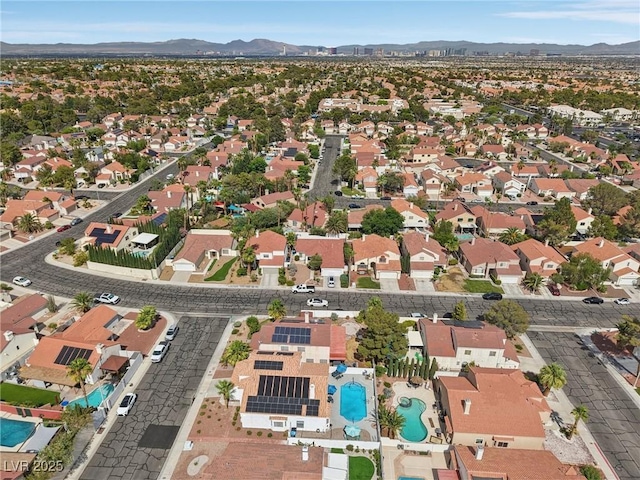 9405 Crosspointe Ave, Las Vegas, NV 89117 - aerial view of property's location with a mountain backdrop and nearby suburban area