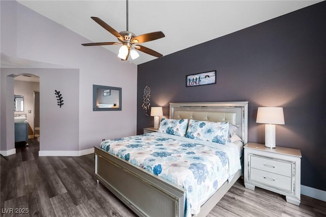 9405 Crosspointe Ave, Las Vegas, NV 89117 - bedroom featuring arched walkways, wood finished floors, lofted ceiling, and ceiling fan