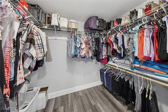 9405 Crosspointe Ave, Las Vegas, NV 89117 - spacious closet featuring wood finished floors