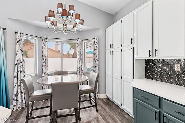9405 Crosspointe Ave, Las Vegas, NV 89117 - dining room with a chandelier and dark wood-type flooring
