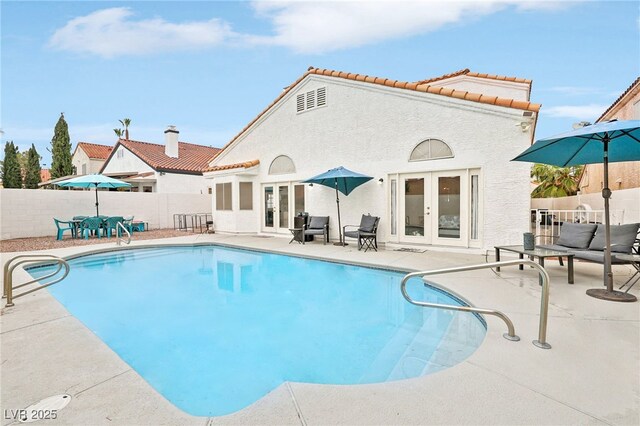 9405 Crosspointe Ave, Las Vegas, NV 89117 - view of swimming pool with french doors and a patio