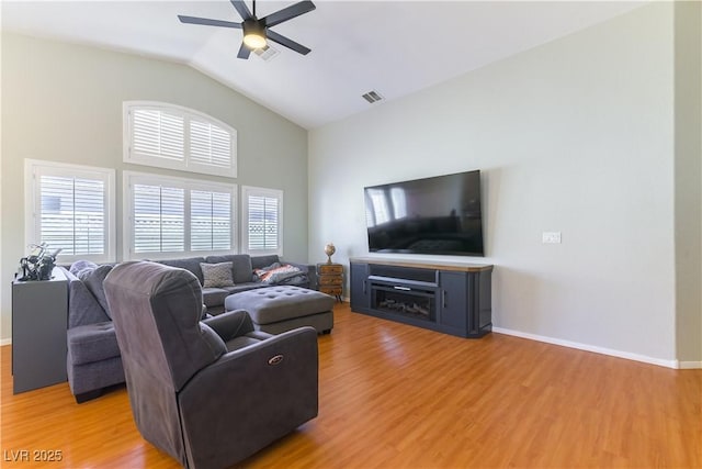 625 Bright Lights Ave, North Las Vegas, NV 89031 - living room with ceiling fan, light wood-type flooring, and high vaulted ceiling