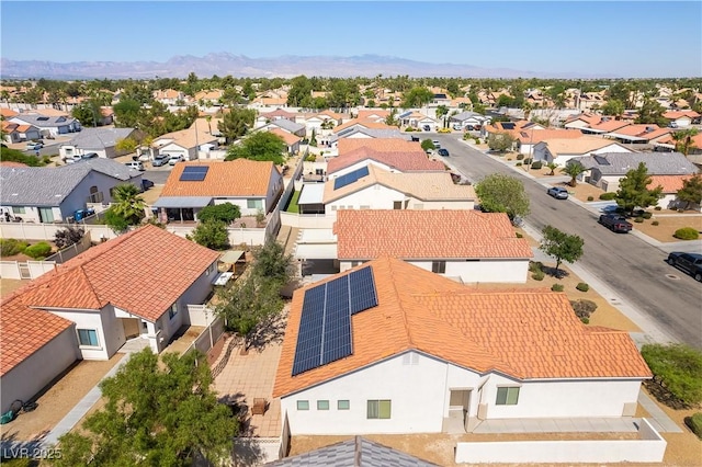 625 Bright Lights Ave, North Las Vegas, NV 89031 - aerial perspective of suburban area with a mountain backdrop