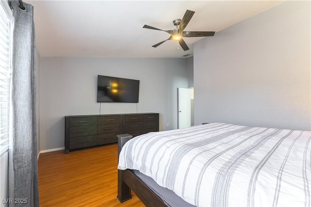 625 Bright Lights Ave, North Las Vegas, NV 89031 - bedroom featuring light wood-type flooring, a ceiling fan, and vaulted ceiling