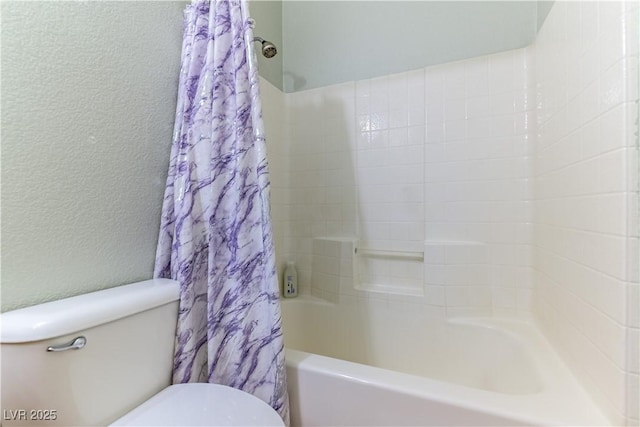 625 Bright Lights Ave, North Las Vegas, NV 89031 - bathroom with shower / bath combo with shower curtain and a textured wall