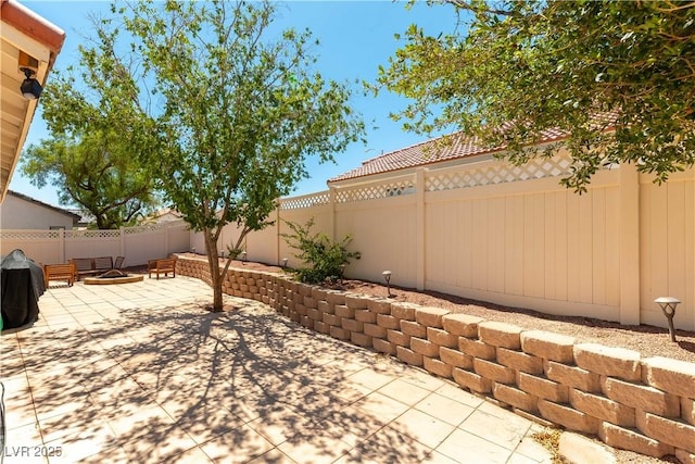 625 Bright Lights Ave, North Las Vegas, NV 89031 - fenced backyard with a patio