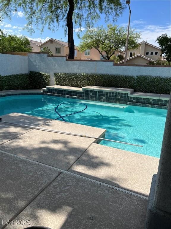 11004 Mount Royal Ave, Las Vegas, NV 89144 - view of swimming pool featuring a patio area