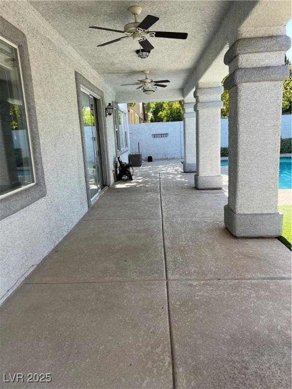 11004 Mount Royal Ave, Las Vegas, NV 89144 - view of patio / terrace with ceiling fan and an outdoor pool