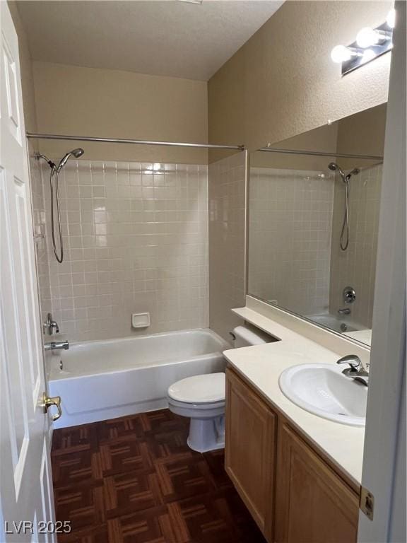 11004 Mount Royal Ave, Las Vegas, NV 89144 - bathroom with shower / bathtub combination, vanity, and a textured wall