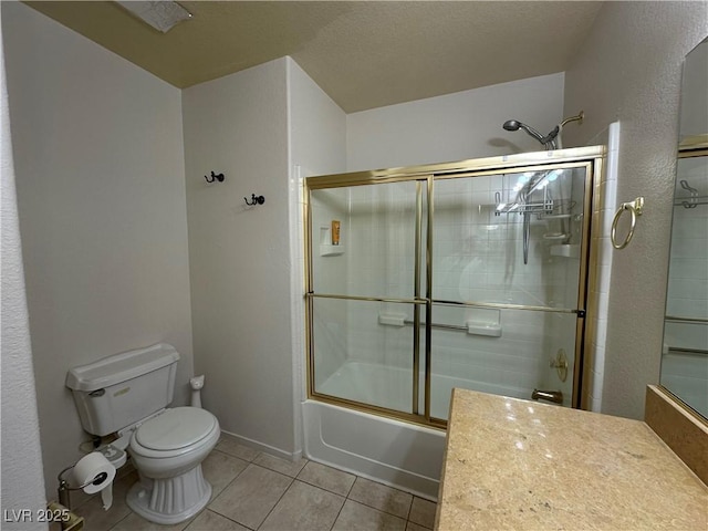 5449 Bugle Way Unit 105, Las Vegas, NV 89108 - full bath with tile patterned floors, bath / shower combo with glass door, and vanity