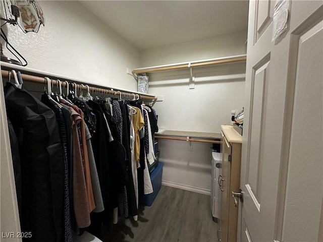 5449 Bugle Way Unit 105, Las Vegas, NV 89108 - walk in closet with wood finished floors