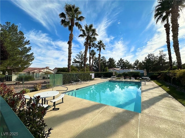 5449 Bugle Way Unit 105, Las Vegas, NV 89108 - community pool featuring a patio