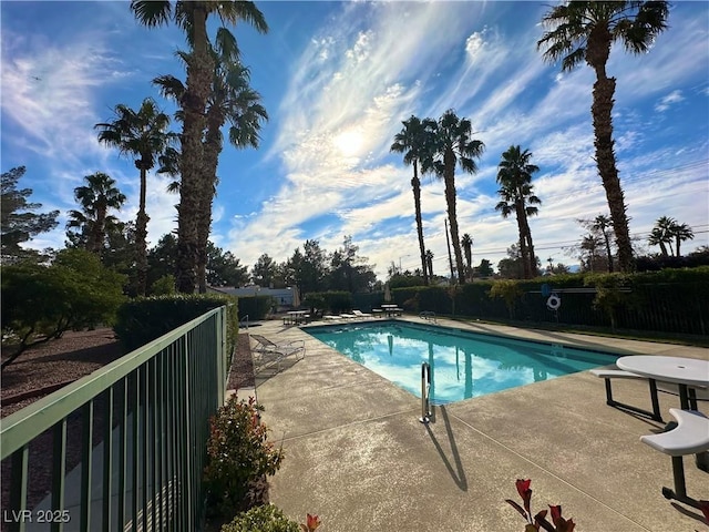 5449 Bugle Way Unit 105, Las Vegas, NV 89108 - community pool with a patio area
