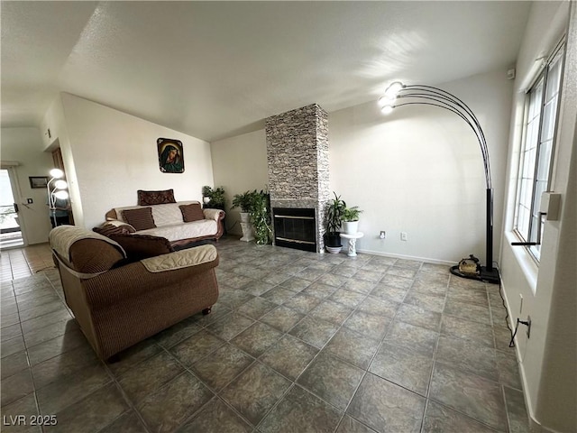 5449 Bugle Way Unit 105, Las Vegas, NV 89108 - living room with a fireplace and baseboards