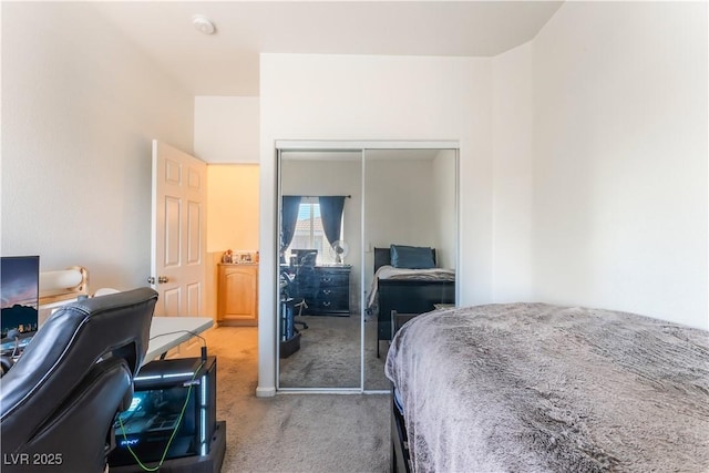 6312 Beige Bluff St Unit 102, North Las Vegas, NV 89081 - bedroom with carpet, a closet, and a desk