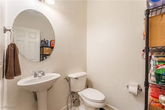 6312 Beige Bluff St Unit 102, North Las Vegas, NV 89081 - bathroom with toilet and baseboards