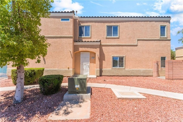 6312 Beige Bluff St Unit 102, North Las Vegas, NV 89081 - view of front of house featuring stucco siding