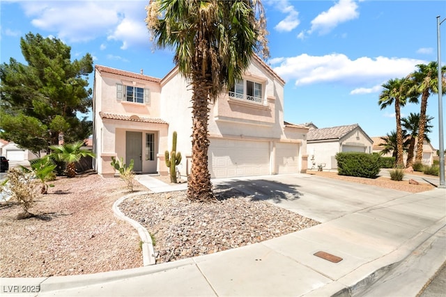 4062 W El Campo Grande Ave, North Las Vegas, NV 89031 - mediterranean / spanish house featuring a garage, a tiled roof, stucco siding, and concrete driveway
