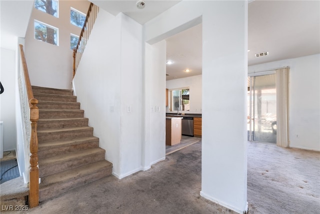 4062 W El Campo Grande Ave, North Las Vegas, NV 89031 - stairs with carpet and recessed lighting