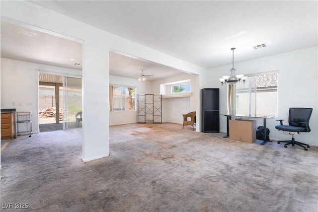 4062 W El Campo Grande Ave, North Las Vegas, NV 89031 - carpeted living area featuring a chandelier and a ceiling fan