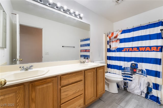 4062 W El Campo Grande Ave, North Las Vegas, NV 89031 - full bath featuring double vanity and wood finished floors