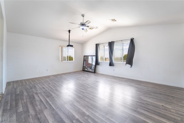 4062 W El Campo Grande Ave, North Las Vegas, NV 89031 - empty room with a ceiling fan, lofted ceiling, and wood finished floors