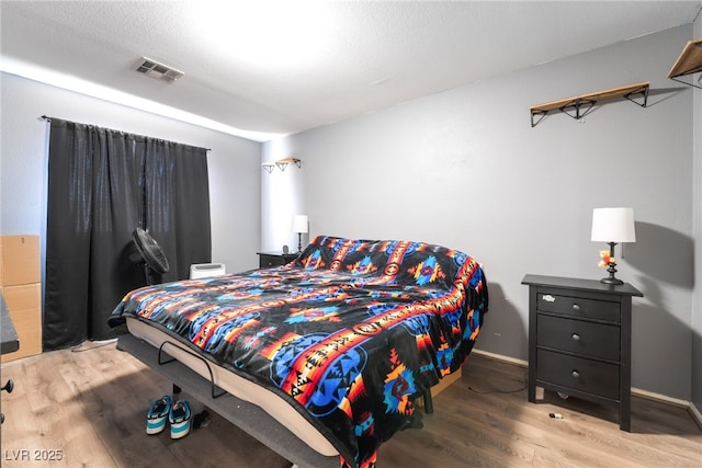 4062 W El Campo Grande Ave, North Las Vegas, NV 89031 - bedroom featuring wood finished floors