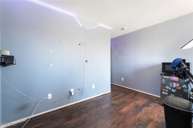 4062 W El Campo Grande Ave, North Las Vegas, NV 89031 - unfurnished office featuring wood finished floors and baseboards