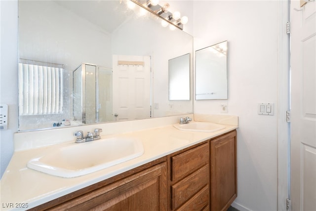 4062 W El Campo Grande Ave, North Las Vegas, NV 89031 - bathroom featuring double vanity and a stall shower