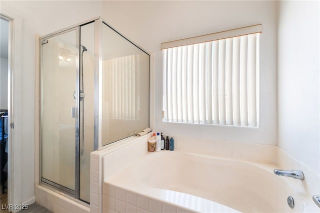 4062 W El Campo Grande Ave, North Las Vegas, NV 89031 - full bathroom with a shower stall and a bath
