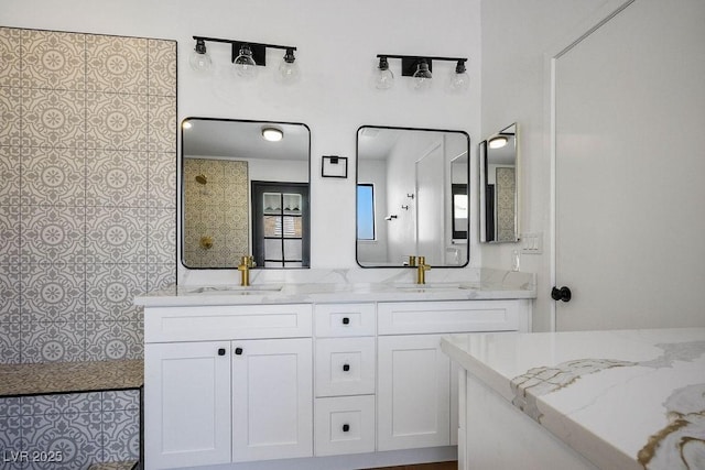 4319 Basil Leaf Ave, North Las Vegas, NV 89031 - full bathroom featuring double vanity and a walk in shower