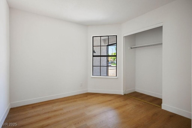4319 Basil Leaf Ave, North Las Vegas, NV 89031 - unfurnished bedroom with wood finished floors and a closet