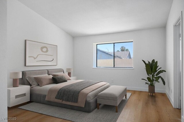 4319 Basil Leaf Ave, North Las Vegas, NV 89031 - bedroom with wood finished floors and baseboards