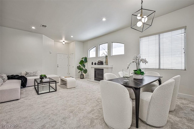 920 Siena Hills Ln, Las Vegas, NV 89144 - carpeted dining room with a glass covered fireplace and recessed lighting