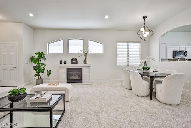 920 Siena Hills Ln, Las Vegas, NV 89144 - living area with carpet floors, healthy amount of natural light, recessed lighting, and a glass covered fireplace