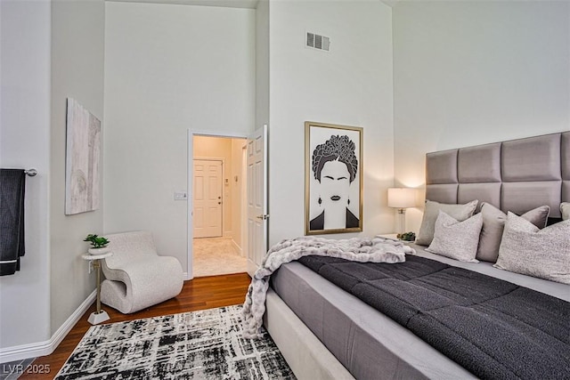 920 Siena Hills Ln, Las Vegas, NV 89144 - bedroom with a high ceiling and wood finished floors