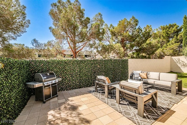 920 Siena Hills Ln, Las Vegas, NV 89144 - fenced backyard with an outdoor living space, a grill, and a patio