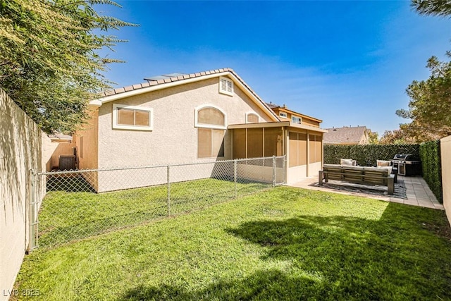 920 Siena Hills Ln, Las Vegas, NV 89144 - rear view of property with outdoor lounge area, a fenced backyard, stucco siding, and a sunroom