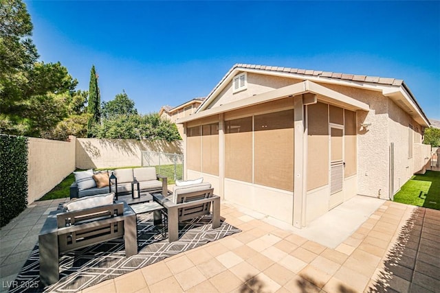 920 Siena Hills Ln, Las Vegas, NV 89144 - fenced backyard with an outdoor hangout area, a patio area, and a sunroom