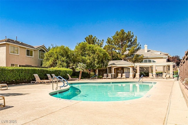 920 Siena Hills Ln, Las Vegas, NV 89144 - community pool with a patio and a pergola