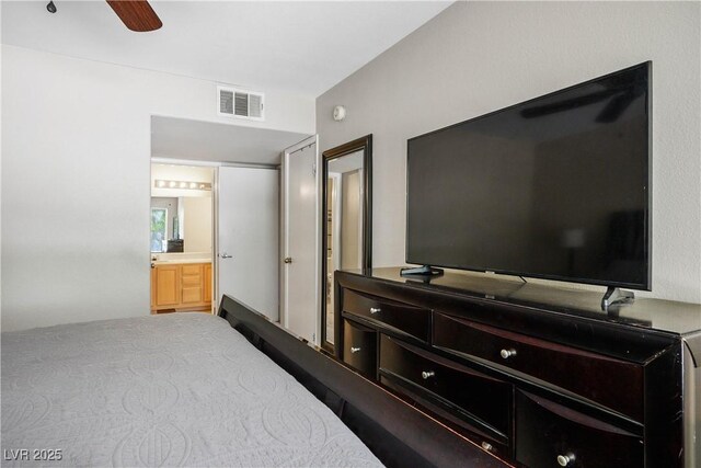 3042 Tarpon Dr Unit 202, Las Vegas, NV 89120 - bedroom featuring connected bathroom and ceiling fan