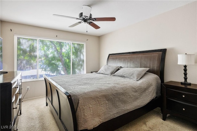 3042 Tarpon Dr Unit 202, Las Vegas, NV 89120 - bedroom with light carpet and ceiling fan