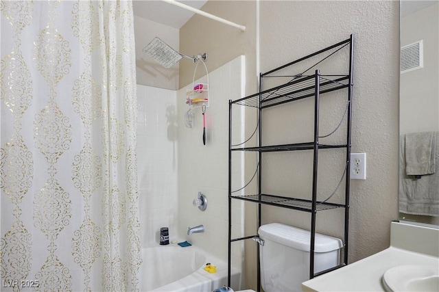 3042 Tarpon Dr Unit 202, Las Vegas, NV 89120 - full bathroom with shower / bath combo with shower curtain, a textured wall, and vanity