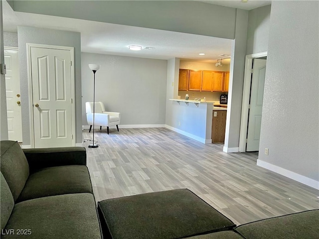 2627 S Durango Dr Unit 202, Las Vegas, NV 89117 - living room featuring light wood-style flooring