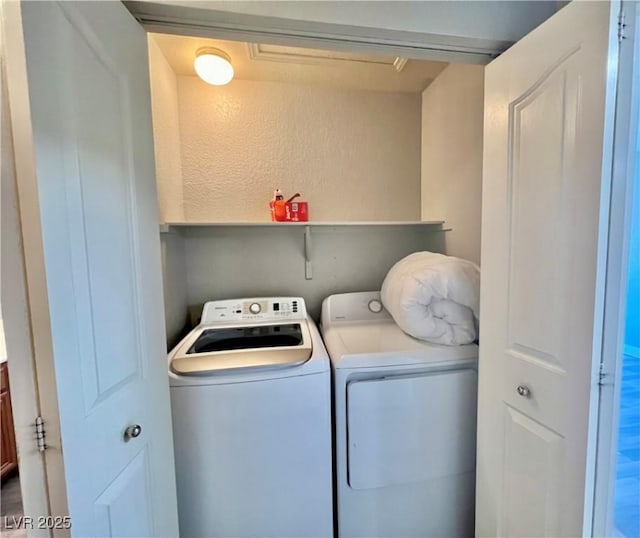 2627 S Durango Dr Unit 202, Las Vegas, NV 89117 - laundry area with washer and clothes dryer