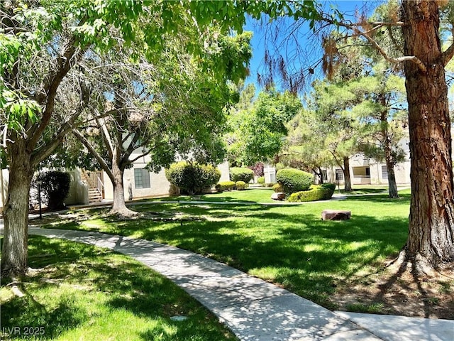 2627 S Durango Dr Unit 202, Las Vegas, NV 89117 - view of property's community with a lawn