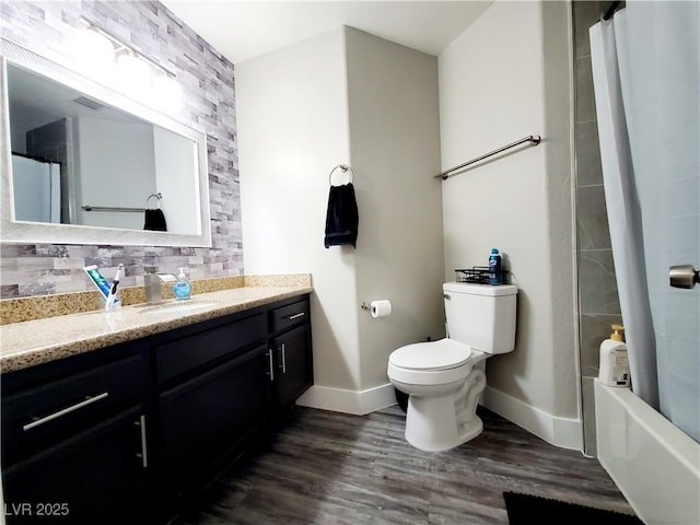 5104 Brookmere Dr, Las Vegas, NV 89130 - full bath with vanity, wood finished floors, and shower / bath combo with shower curtain