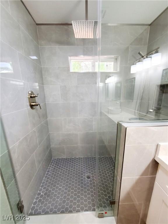 5104 Brookmere Dr, Las Vegas, NV 89130 - bathroom featuring a stall shower and vanity