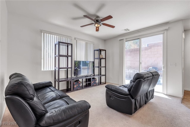 9269 Moonlight Nest Ln, Las Vegas, NV 89178 - living area featuring a ceiling fan and carpet flooring